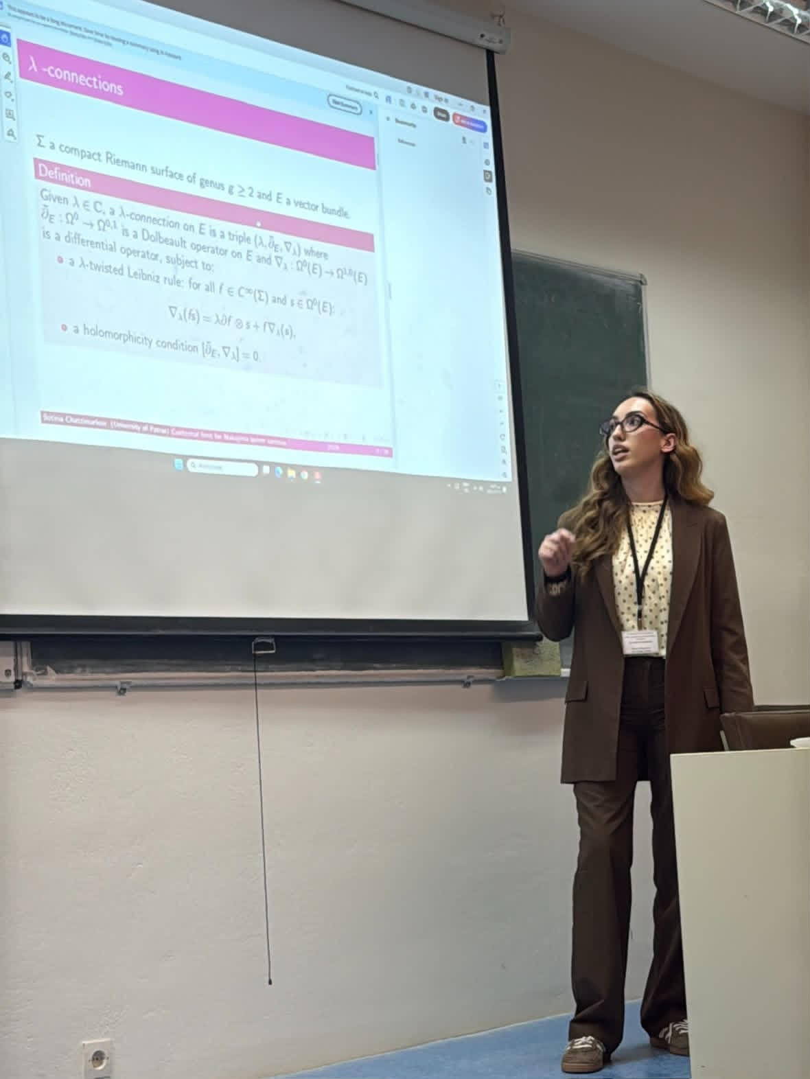Sotiria Chatzimarkou presenting a slide on λ-connections and Riemann surfaces